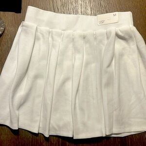 White pleated skirt